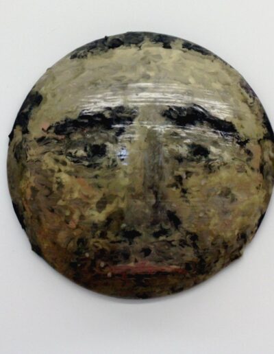 "Man On The Moon" - 1996 - 10" round. Paintskin face stretched over a Baby Moon hubcap.