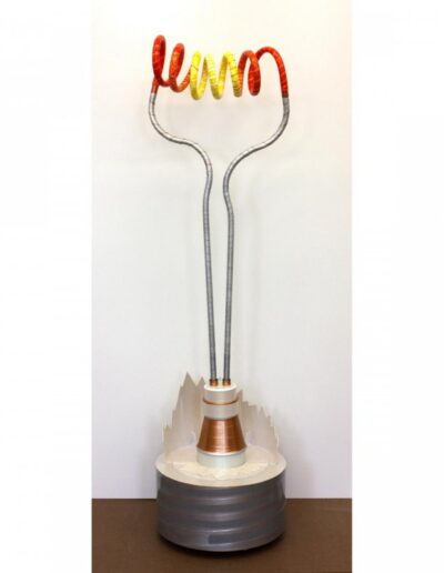 "Miss Incandescent - 100 Watts" - 2013 - 62"h.x16"w.x16"d. Paintskin wrapped assemblage. The forces behind this work are related to the demise of the incandescent 100 watt light bulb.